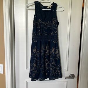 Summer dress. Size small. Navy with beige underlay. Worn once to a wedding.